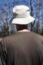 Australia: bushwalking man with flies on back Royalty Free Stock Photo
