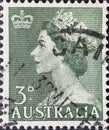 AUSTRALIA-CIRCA 1953: A post stamp printed in Australia showing a portrait of Queen Elizabeth II Definitive 1953-1956