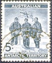 Postage stamp printed in Australia with a picture of Alistair McKay, Edgeworth David and Douglas Mawson at the South pole Royalty Free Stock Photo