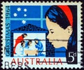 AUSTRALIA - CIRCA 1964: A stamp printed in Australia from the `Christmas ` issue shows a child looking at Nativity Scene