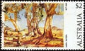 AUSTRALIA - CIRCA 1974: A stamp printed in Australia shows `Red Gums of the Far North 1930` Hans Heysen, circa 1974.