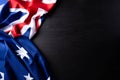 Australia day concept. Australian flag with the text Happy Australia day against a blackboard background. 26 January Royalty Free Stock Photo