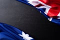 Australia day concept. Australian flag with the text Happy Australia day against a blackboard background. 26 January Royalty Free Stock Photo