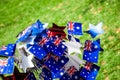 Australia Day decorations - flag and blue, red and white stars on a green grass background