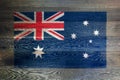 Australia flag on rustic old wood surface background Royalty Free Stock Photo
