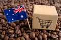 Australia flag with shopping cart on coffee bean, import export trade online commerce Royalty Free Stock Photo