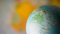 Australia map on a globe with earth map in the background. Royalty Free Stock Photo