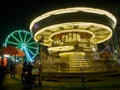 Bright illuminated lights from festival rides