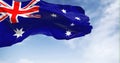 Australia national flag waving in the wind on a clear day Royalty Free Stock Photo
