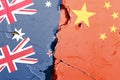 Australia, New Zealand, China national flag isolated on broken wall background