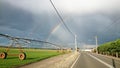 Australia Road View - Irrigator and Double Rainbows Royalty Free Stock Photo