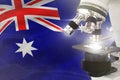 Australia science development concept - microscope on flag background. Research in medicine or biochemistry 3D illustration of