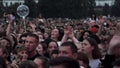 Australia - Sydney, 08.25.2019: crowd at music concert, audience raising .ands up and having fun. Action. Many people