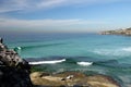 Australia: Tamarama beach city view with surfers Royalty Free Stock Photo