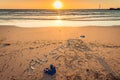 Australia text with thongs, flag and sunglasses on beach