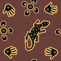 Australian aboriginal seamless vector pattern with dotted circles, lizard, palms, boomerangs and spirals Royalty Free Stock Photo