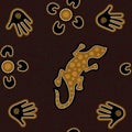 Australian aboriginal seamless vector pattern with dotted circles, lizard, palms, boomerangs and spirals Royalty Free Stock Photo