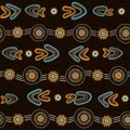 Australian aboriginal seamless vector pattern with dotted circles, rings, boomerangs and wavy stripes Royalty Free Stock Photo