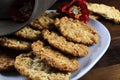 Australian army slouch hat and traditional Anzac biscuits close up