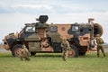 Australian Army soldiers with a Bushmaster armoured Personnel carrier APC