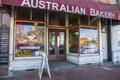 The Australian Bakery CafÃ© with a green neon open sign in the window in the Marietta Square in Marietta Georgia Royalty Free Stock Photo