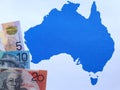 australian banknotes and background with Australia map silhouette Royalty Free Stock Photo