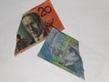 Australian banknotes of different denominations on the broken sheet of paper Royalty Free Stock Photo