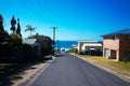 Australian beach street with middle class buildings near ocean