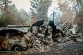 Australian bushfire aftermath: Burnt building and car carcass Royalty Free Stock Photo