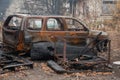 Australian bushfire aftermath: Burnt car and rubble Royalty Free Stock Photo