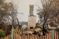 Australian bushfire aftermath: A lonely chimney on burnt building remains