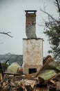 Australian bushfire aftermath: A lonely chimney on burnt building remains Royalty Free Stock Photo