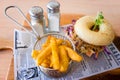 Australian Chicken Bagel Burger With Chips Royalty Free Stock Photo