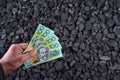 Australian currency showed on coal of mine deposit mineral resources background Royalty Free Stock Photo