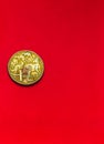 Australian dollar coin front isolated on red background with soft blurry and space for copy text. One dollar coin 1995 Australian Royalty Free Stock Photo