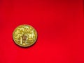 Australian dollar coin front isolated on red background with soft blurry and space for copy text. One dollar coin 1995 Australian Royalty Free Stock Photo