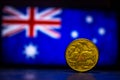 Australian dollar coin isolated on Australia flag background with space for copy text. One dollar coin 1995 Australian currency. Royalty Free Stock Photo