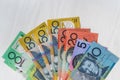 Australian dollars in fan on wooden table, closeup Royalty Free Stock Photo