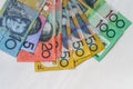 Australian dollars in fan on wooden table, closeup Royalty Free Stock Photo