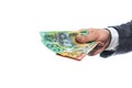 Australian dollars in male hand isolated on white Royalty Free Stock Photo