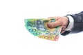 Australian dollars in male hand isolated on white Royalty Free Stock Photo