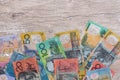 Australian dollars on wooden table as background Royalty Free Stock Photo