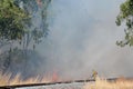 Australian fire fighter fight bush fire in Queensland Australia Royalty Free Stock Photo