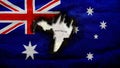 Australian Flag with burnt hole revealing vintage map of Australia Royalty Free Stock Photo