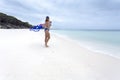 Smiling female holding Australian flag and wearing flag bikini Royalty Free Stock Photo