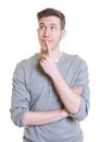 Australian guy in a grey shirt has an idea Royalty Free Stock Photo