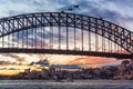 Australian iconic landmark Sydney Harbour Bridge against picturesque sunset sky Royalty Free Stock Photo