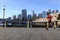 Australian man runs on Circular Quay Wharf in Sydney, Australia Royalty Free Stock Photo