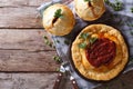 Australian meat pie on the table, horizontal view from above