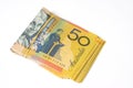 Stack of fifty Australian dollar bills on white background. Royalty Free Stock Photo